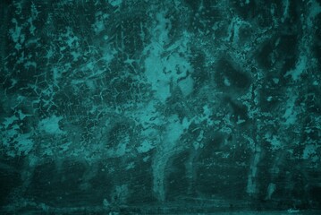 cracked wall background with light green rays, The background is a combination of dark green and...