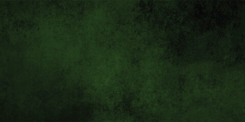 Fototapeta premium Macro shot of a deep green painted surface with visible brushstrokes and subtle imperfections. 