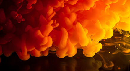 Fiery Abstract Composition of Orange and Yellow Ink Plumes Suspended In Liquid