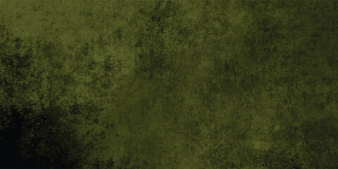 Close-up of a dark green grunge texture revealing intricate grainy details and rough surface.
