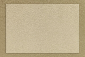 Fototapeta premium Texture craft beige color paper background with brown border, macro. Structure vintage dense kraft sand cardboard