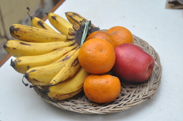 bananas oranges and apples served
