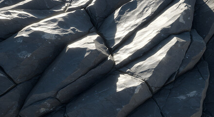 Sunlit Sedimentary Rock Formation Displays Dramatic Textures And Shadows