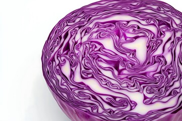 Obraz premium Close-up view of a vibrant red cabbage cross-section. Intricate, swirling layers of deep purple and creamy white