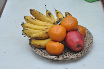 bananas oranges and apples served