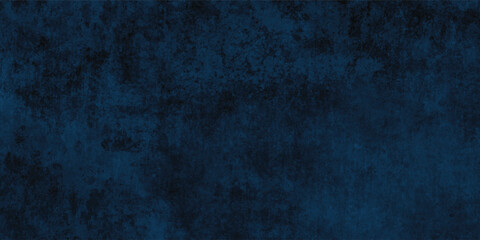 Industrial-style dark blue concrete background with a textured and slightly mottled surface.
