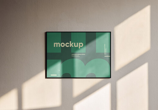 Mockup Of Customizable Horizontal Poster On Wall
