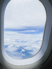 travel and transportation concept with see city and beautiful sky from airplane window