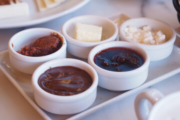 Savoring traditional condiments served on a white platter