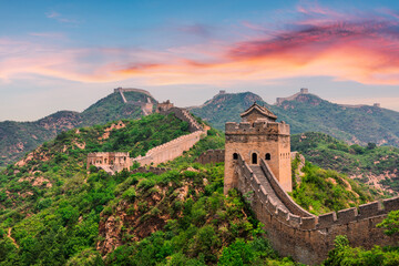 The great wall of china at sunset with beautiful sky and mountain landscape