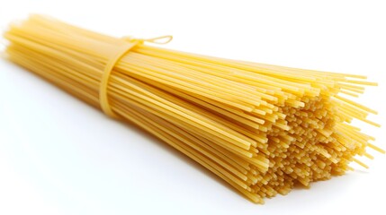A bundle of dry spaghetti pasta is tied together with a rubber band on a white background.