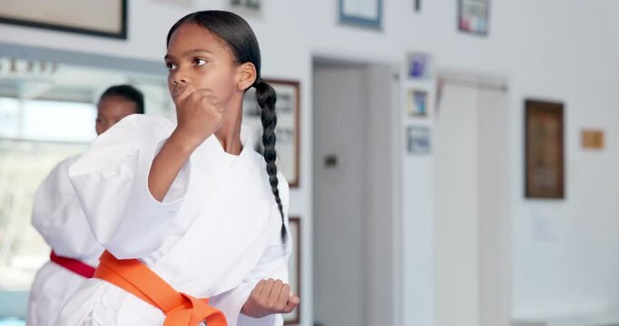 Teaching karate, children and exercise in dojo for fight, fitness lesson or self defense class. Students, instructor and practice martial arts with man for workout, learning kick or kids training