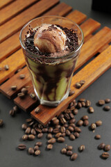 a glass of avocado smoothie coffee with vanilla ice cream