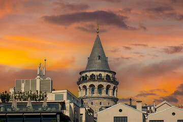 Fototapeta premium The Galata tower and the old quarters of Istanbul on the background of blue sky. Tourist destination Istanbul Turkey