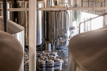 Brewing tanks and kegs at a micro brewery