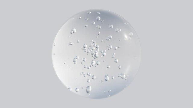 Close-up of a clear bubble with tiny air bubbles inside, floating against a neutral gray background. Ideal for concepts related to purity, freshness, or skincare products