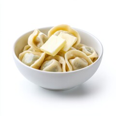 Dumplings (pelmeni) topped with a pat of butter, served in a plain white bowl, isolated on pure white background