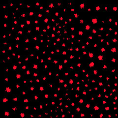 Abstract pattern of scattered, vibrant red shapes on a black background, creating a striking contrast and dynamic texture.