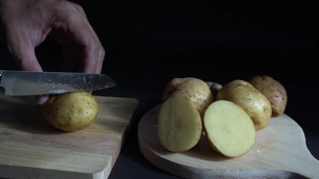 Slicing apples on a wooden cutting board