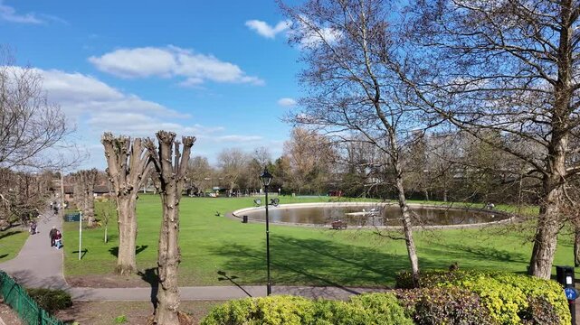 Newbury Berkshire England UK.  09.04..2025. Video. Overview of  Victoria Park and pollarded trees in the town centre Newbury UK.