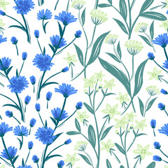 Seamless pattern with yellow and blue wild flowers on the meadow