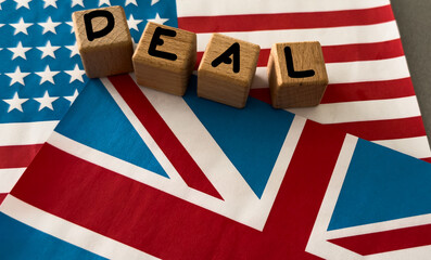 Political flags of United Kingdom and United States of America on table. concept of negotiations,...