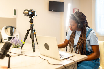 Teenager vlogger recording video content at home