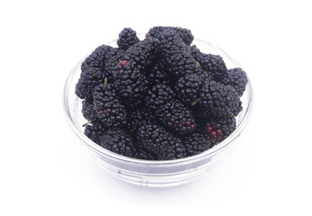 Mulberry in glass bowl isolated on white background.	