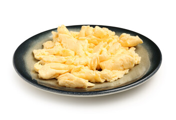 Plate of delicious scrambled eggs isolated on white background