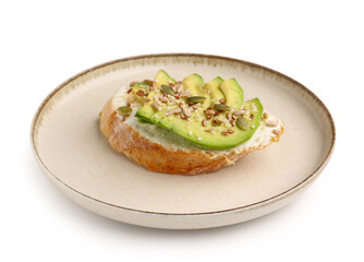 Plate of tasty bruschetta with avocado on white background