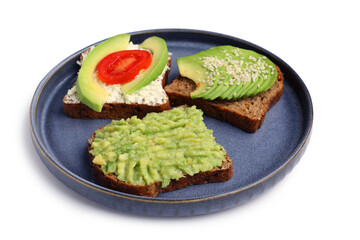 Plate of tasty avocado toasts on white background