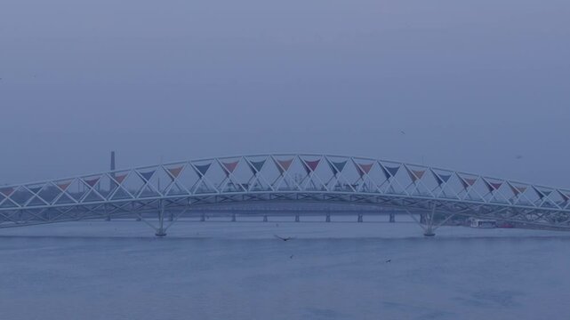 Atal Pedestrian Bridge is a pedestrian triangular truss bridge at Sabarmati Riverfront on Sabarmati River in Ahmedabad, Gujarat, India. It has a design inspired by kites.