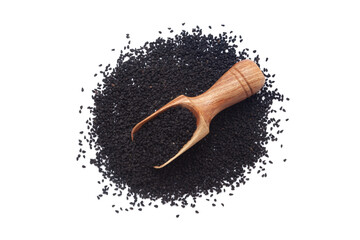 A wooden scoop filled with organic Black Cumin (Nigella sativa) or kalonji, placed on a heap of nigella seeds, isolated on a white background.