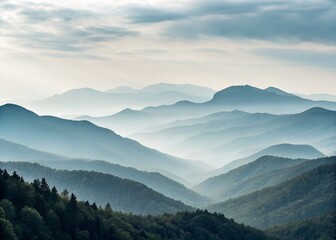 Fototapeta premium Soft, mist-covered mountains stretch into the distance, evoking a sense of calm and serenity.