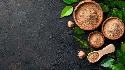 Natural Brown Powder in Bowls Surrounded by Fresh Green Leaves