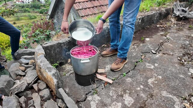 A pot of Cranberry bean cooked on a fire in Camacha mountainous town in municipality of Santa Cruz, Madeira Island, Portugal