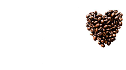 A heart made of coffee beans on a white surface