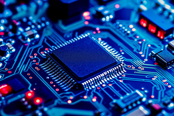 A close up of a computer motherboard with a chip on it