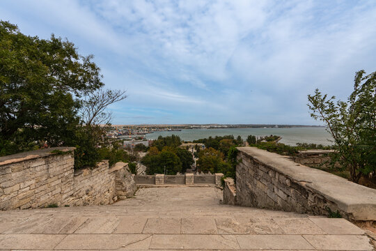 Mithridates Staircase in Kerch. Ancient stone steps lead to the top of Mount Mithridates, demonstrating historical architecture in the midst of nature.