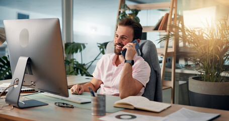 Phone call, computer and happy man in office for virtual meeting, online discussion and communication. Creative business, web designer and person on smartphone for conversation, talking and chat