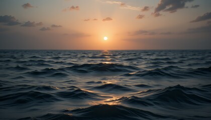 Obraz premium A beautiful orange sunset reflects on the sea near the beach, painting the evening sky with light