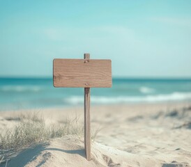 Empty wooden sign on sandy beach