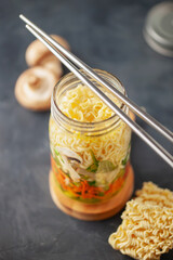 Healthy homemade instant noodles with vegetables in mason jar. Asian  vegetarian lunch idea. To-Go Miso Noodle Soup