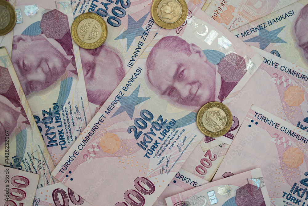 Poster Turkish lira banknotes with golden coins lie on table illustrating problem of volatile currency with high inflation rate on grounds of monetary policy decisions