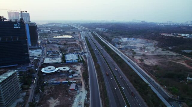 Gar infobahn under construction building with outer ring road and concrete mining at day time, moving down shot, drone shot, 4k.