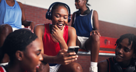 Phone, online and headphones with black woman on basketball court for sports progress, athlete scouting and streaming. Score tracking, training program and subscription with person for game updates