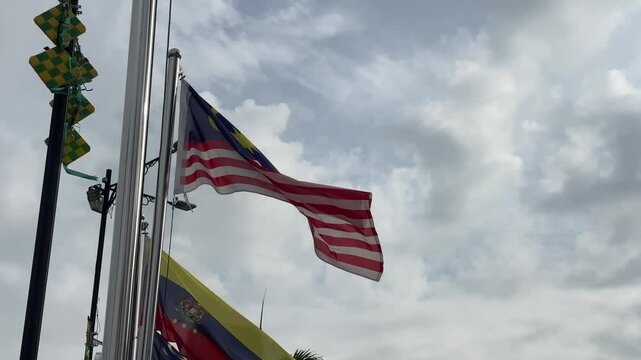 Flag of the country of malaysia blowing gently in the wind in kuala lumpur city malaysian flags