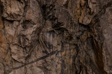 Close-up of rugged, textured rock face