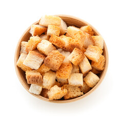 Bowl with crunchy croutons isolated on white background, top view
