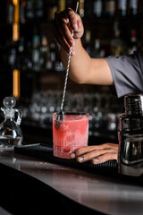 Pink Cocktail Creation A Bartenders Artistic Stirring